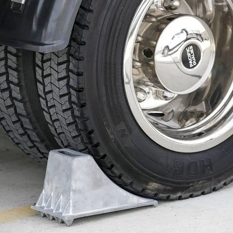 Beefy Aluminum Wheel Chock With Rugged Teeth For Extra Grip And Stability Steep Slope Design 55000 Lb Capacity Heavy Duty Parking Tool