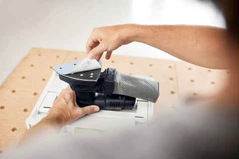 Using the Granat DTS Delta Abrasive Systainer GR Set For VOC Paints And Hard Surfaces, attaching garnet sheet to sander