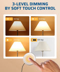 Three lamps with 3-level dimming and a hand using a touch control on a Two Pack Touch Dimmer Switch With 3 Level Dimming And Touch Pad Control For LED CFL And Incandescent Bulbs 8 Ft Extension Cord ETL Listed Black Great For Any Room.