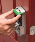 Assure SL Keyless Entry Deadbolt Lock With Z Wave For Smart Home, oil rubbed bronze finish, touchscreen backlit keypad being installed