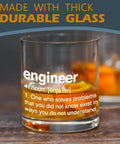 Engineering Themed Whiskey Glass Gift For Men 10 oz rocks glass with definition of engineer on table with whiskey inside.