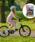 Child riding bike with colorful spokes; inset shows 72 Pack Colorful Bike Spoke Beads Kid Friendly Clip On Plastic Beads With Star And Round Shapes