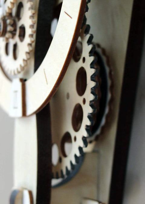 Close-up of 3D wooden gears from Mechanical Clock Kit For Walls 3D Wood Puzzle DIY With Pendulum And Wooden Gears No Batteries Needed Runs 36 Hours On One Wind Vintage Style Dope Modern Manual Clock For Home Wall Decor.