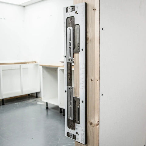 No Fuss Adjustable Door Latch And Strike Plate Router Jig featuring knockout precision mounted on wood for accurate mortise cuts.
