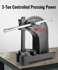 Heavy Duty Manual Arbor Press 3 Ton Desktop Punch Machine Cast Iron Hand Press on workbench showcasing its controlled pressing power.
