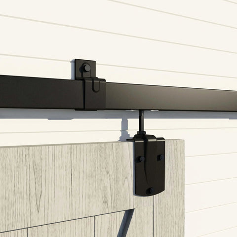 Heavy Duty Outdoor Sliding Barn Door Hardware Kit For Exterior Use With 450 Lb Capacity Black Powder Coated Finish Built To Endure Outdoor Weather Tough As Nails Fits Two Doors Up To 144 Inches Wide, close-up installation view showing black hardware on wooden door.