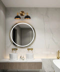 Modern Farmhouse Bathroom Light Fixtures In Black And Brushed Gold Over Mirror Vanity Lights That Give Your Bathroom A Boss Vibe, Two Light Vanity Lighting With Black Metal Shade, Durable Contemporary Bath Sconce Set For A Stylish Home above a round mirror.