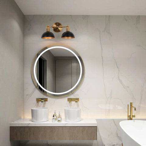 Modern Farmhouse Bathroom Light Fixtures In Black And Brushed Gold Over Mirror Vanity Lights That Give Your Bathroom A Boss Vibe, Two Light Vanity Lighting With Black Metal Shade, Durable Contemporary Bath Sconce Set For A Stylish Home above a round mirror.