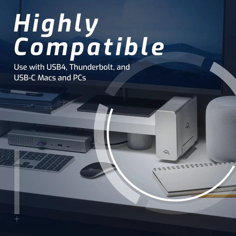 Tough Aluminum Four Slot Nvme M.2 Ssd Enclosure With Blazing Usb4 Kick Thunderbolt Sync on a workspace setup.