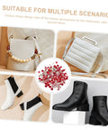 DIY bead rivet kit with red rhinestones and plastic rivets for clothing; center close-up