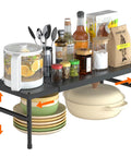 Hella Adjustable And Stackable Kitchen Cabinet Organizer, Pretty Darn Solid Metal Pantry Shelf displaying snacks and dishes on a kitchen shelf.