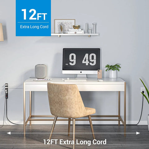 Office setup with surge protector power strip, 12 ft extension cord, flat plug hidden behind desk, 6 outlets, wall mountable.