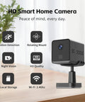 Smart HD camera with motion detection, night vision, local storage, Wi-Fi shown on a table in a modern setting.