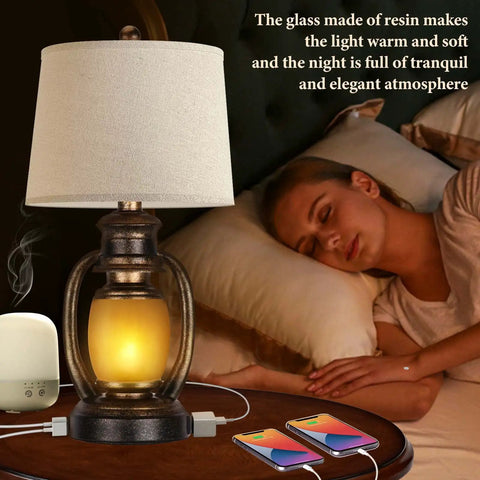 Set Of 2 Rustic Farmhouse Table Lamps With Built In USB Ports And Outlet For Living Room Or Bedroom, lit next to sleeping person