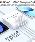 Six Foot Power Strip With Three Outlets And Four USB Ports Including One USB C For Cruise Ship Travel And Home Office Use No Surge Protection ETL Listed White, showing charging phones and tablets.