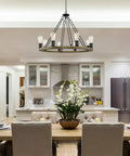 Rustic Wagon Wheel Chandelier With Eight Lights Large Farmhouse Round Kitchen Island Pendant In Smoked Birch Finish With Classic Black Accents Must Have Statement Piece Ceiling Light For Dining Room Or Entryway in modern dining setting.