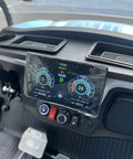 Slick Four Seater Electric Golf Cart Boasting Ridiculously Comfy Luxury Seats And Knobby Antislip Tires With A Sharp Hd Led Display showing dashboard features.