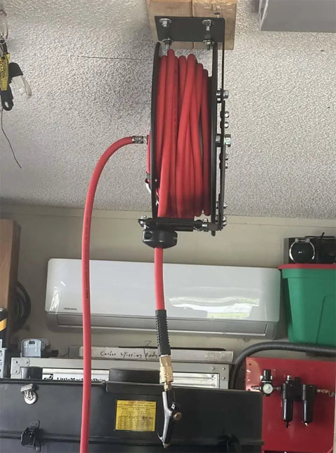 Retractable Air Hose Reel With Wall Or Ceiling Mount, Three Eighths Inch By Fifty Feet Hybrid Hose With Three Feet Lead In, mounted.