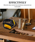Adjustable Yellow Noise Blocking Ear Defenders For Shooting And Industrial Jobs With Slap Up Soundproof Earmuffs positioned on a workbench.