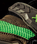 Close-up of Exo Motor Impact Glove For Heavy Duty Work With TPR Impact Protection, brown glove with green accents, Size XL