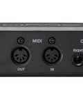 Rear view of UAC 232 32 Bit Float Audio Interface For Music And Streaming With Plug And Play Capability showing MIDI and output ports.