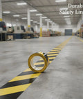 Top Shelf Yellow Floor Marker Tape With Hell Yeah Adhesion For Concrete And Epoxy Surfaces on a warehouse floor.