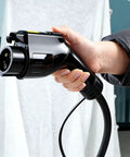 Level 2 Electric Vehicle Charger 40 Amp 240 Volt 9.6 Kilowatts Fast Charging With Nema 14-50 Plug held in hand