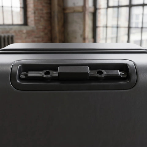 Close-up view of Universal Luggage Handle Replacement Button Telescopic Pull Rod Slick Snap Fit For Suitcases installed on suitcase.