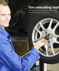 Person using 360 Degree Swivel Head Jack Ratchet Wrench With Forward And Reverse Knob on car tire for quick changes