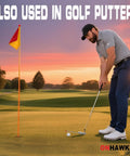 Golfer using putter on a green during sunset with a flagstick nearby, showcasing versatility of Magnetic Golf Alignment Rods With Telescopic Sticks.