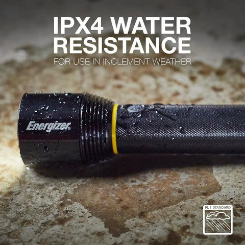 Vision HD Ultra LED Flashlight With Digital Focus, 1800 Lumens, IPX4 water resistant, on wet stone surface, rugged design