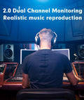 Man using Dual Mode Two Point Zero Studio Monitors For Near Field Music Production Bluetooth Five Point Three Bookshelf Speakers