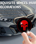 Fresh Four Pack Wheel Center Cap Stickers Featuring A Dope Skull Design In Vivid Red For Any Road Ready Ride These Two Point Two Inch Metal Emblems seen on a hand near a car's wheel.