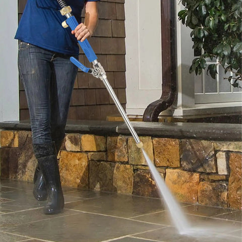 Person using Jet Nozzle Pressure Washer Hose Attachment Be a Cleaning Beast With This Power Wand For Garden Gutter Window And Car Cleaning Blue Fits Standard 3/4 Inch Hoses And 1 Inch Connectors on patio