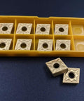 20 Pack CNMG431 Carbide Turning Inserts For Lathe Machining Steel And Stainless Steel With PVD Coating in yellow packaging.