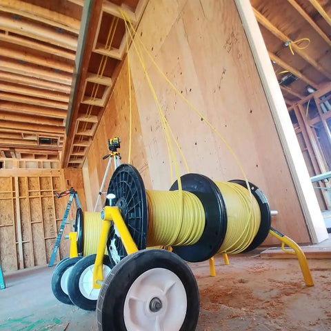 Mobile Wire Reel Rack with Wheels for 18 Inch Diameter Reels Up to 150 Lbs in construction site