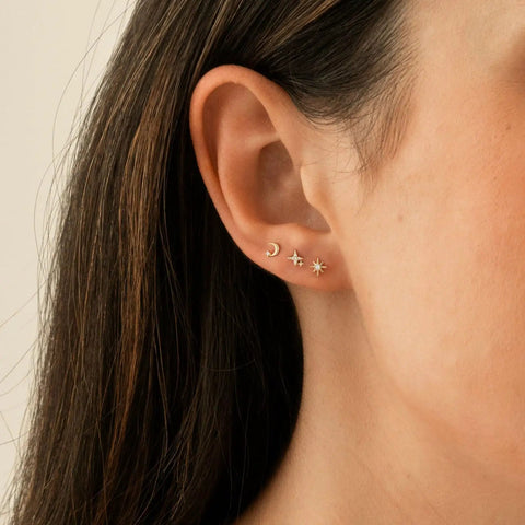 Hypoallergenic Flat Back Earrings For Women 14K Gold Plated Mini Stud Set Of 3 Pairs Featuring Star Moon Sun Shapes Flat Back Cartilage Helix Piercing Jewelry Includes 4mm And 5mm Sizes For Daily Mix And Match. worn in earlobe