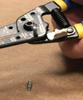 Klein Tools 11055EP wire cutter and stripper, front view with yellow and blue handles.