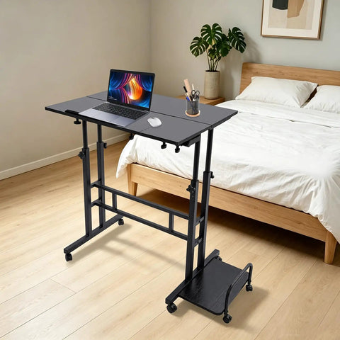 Smooth Operator Height Adjustable Standing Desk With Heavy Duty Steel Build And Six Easy Roll Wheels in a home office setup.