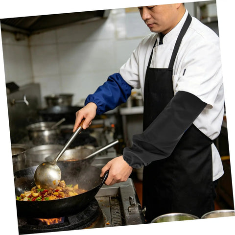 Heavy Duty Welding Arm Sleeves Heat Resistant Cotton Forearm Guards protecting hands while cooking in a professional kitchen.