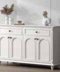 Top Tier Vintage Antique Brass Cabinet And Drawer Knobs 15 Pack Featuring Sweet Wineglass Contour and Heavy Duty Rust Shield for Big Time No Frustration Kitchen Refresh on a stylish white console.