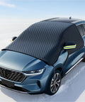 All Season Magnetic Windshield Cover For Ice And Snow on blue SUV with mirror protectors, heavy-duty waterproof frost guard, snowy background