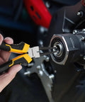 Heavy Duty Snap Ring Pliers Set, Four Piece Kit, 7 Inch Internal And External Circlip Pliers with Straight And Bent Jaw Options, 5/64 Inch Tip in use for removing ring from machinery, Chrome Vanadium Steel Construction.
