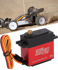 Badass High Torque Coreless Motor Servo Crafted From Tough Aluminum Alloy Housing With Precision Potentiometer And High Resolution Digital Control Chip For Hella Rad Radio Control Steering next to a remote control car in motion.
