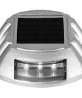 Close-up of a silver solar driveway light with 6 LEDs, part of a Solar Driveway Lights 16 Pack Waterproof Wireless Dock Lights.