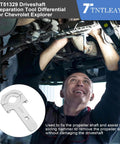 Mechanic using DT51329A Driveshaft Removal Adapter Tool for GM Vehicles with Chevrolet Explorer, assisting in propeller shaft removal.