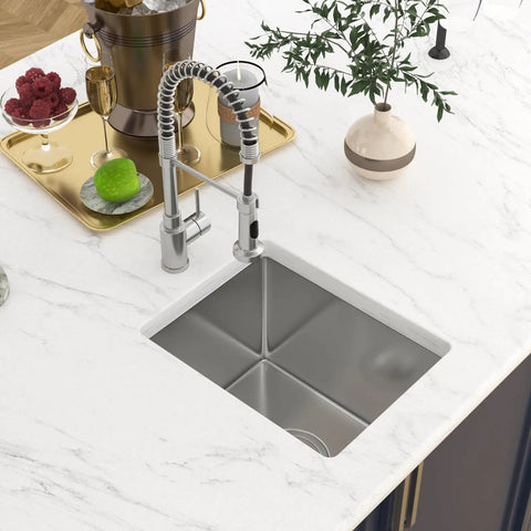 Overhead view of 15 x 17 Inch Undermount Bar Sink In 16 Gauge T304 Stainless Steel, Single Bowl Wet Prep Kitchen Sink on marble countertop.