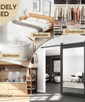 Mirror Barn Door 42 Inch By 84 Inch With 7 Foot Sliding Hardware Kit Included One Lite Full Length Frosted Glass Solid Wood Waterproof PVC Surface No Assembly Required Black Finish shown in various room styles including bedroom, cloakroom, bathroom, and kitchen