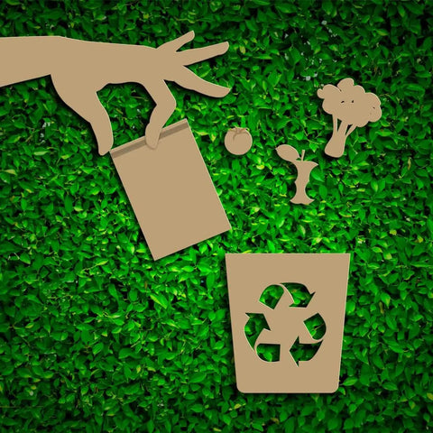 Illustration of recycling process with a hand disposing a compostable pouch and food scraps into a recycle bin on green background