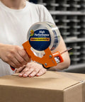Person using dispenser with High Performance Clear Packing Tape Refills, 8 Rolls Of HP260 Heavy Duty Packaging Tape for Box